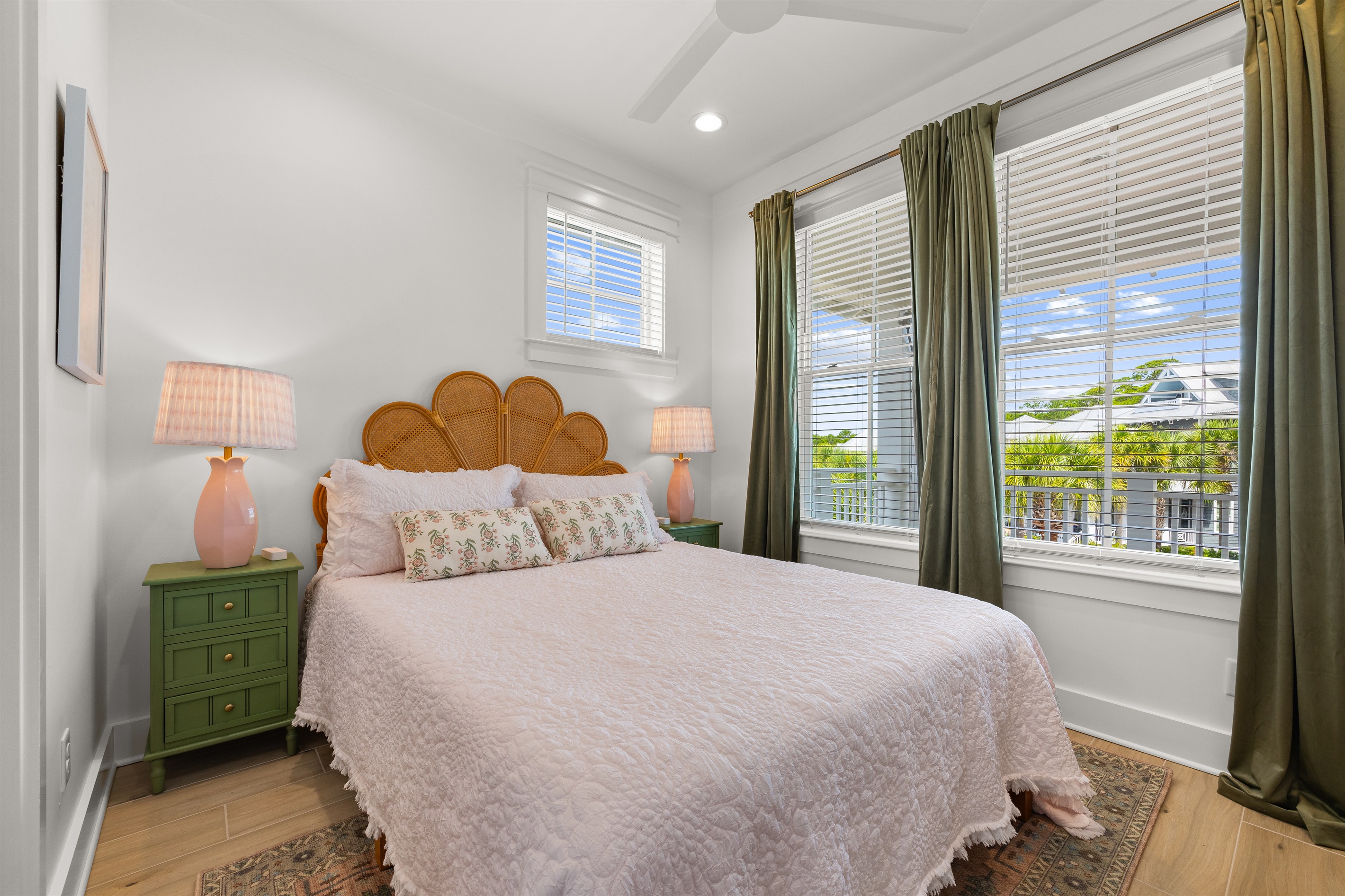 This welcoming queen guest room features comfortable furnishings, coastal-inspired décor, and a relaxing atmosphere.