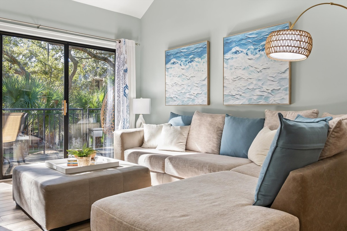 Comfortable living space with sectional and lowcountry views
