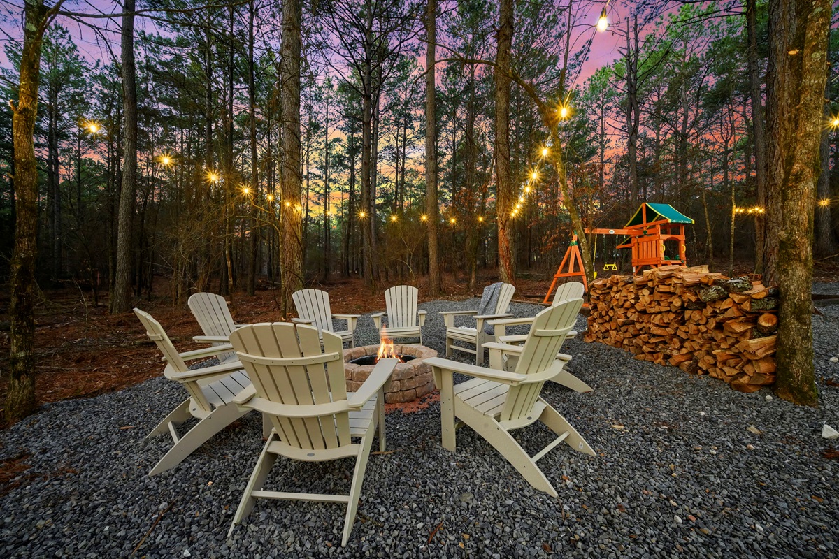 Firepit with Adirondack seating + stacked firewood provided 🔥