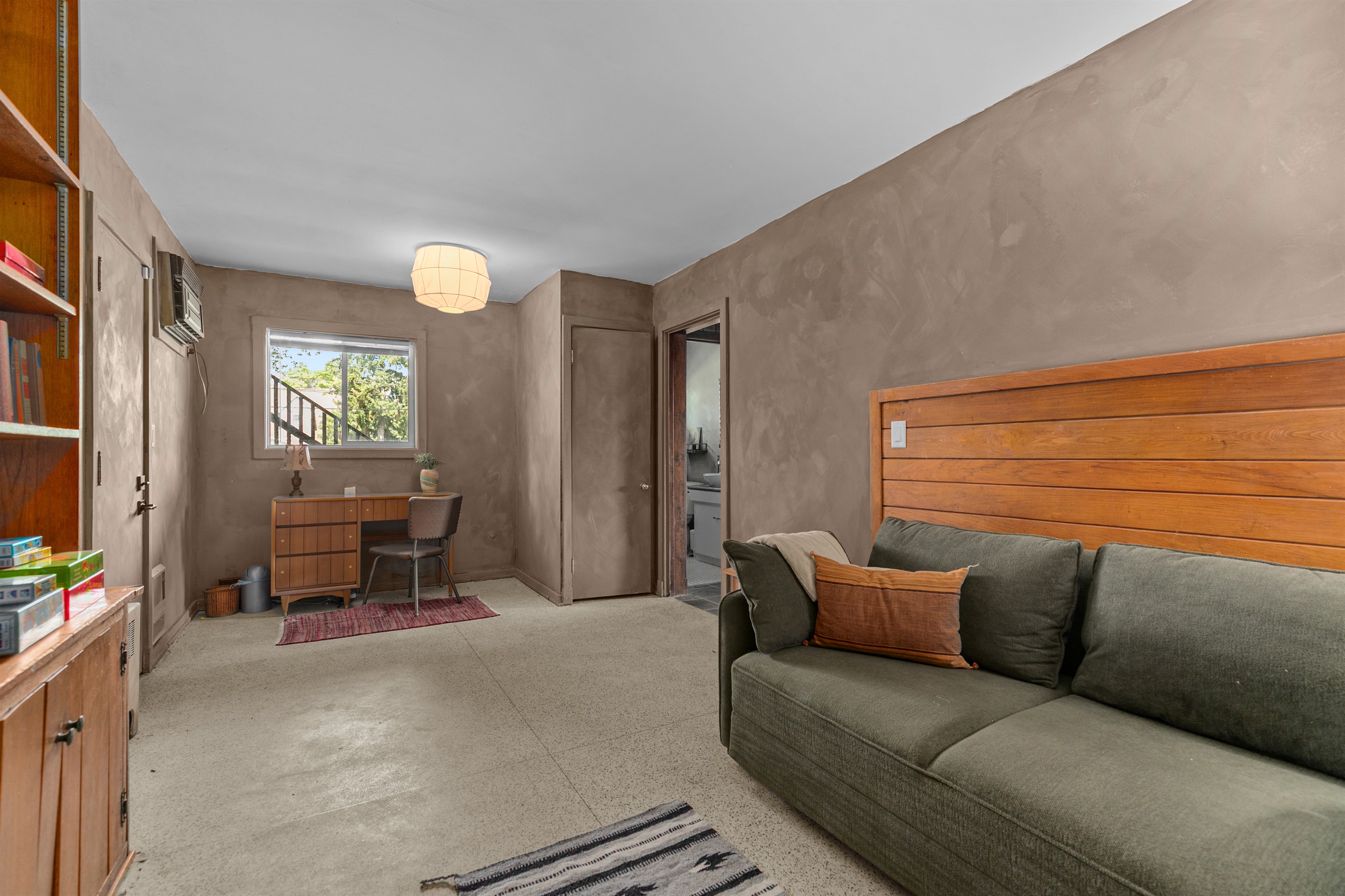 For those who need to balance work with relaxation, the den includes a dedicated desk and chair. It’s a quiet, comfortable spot to catch up on emails or handle a project.