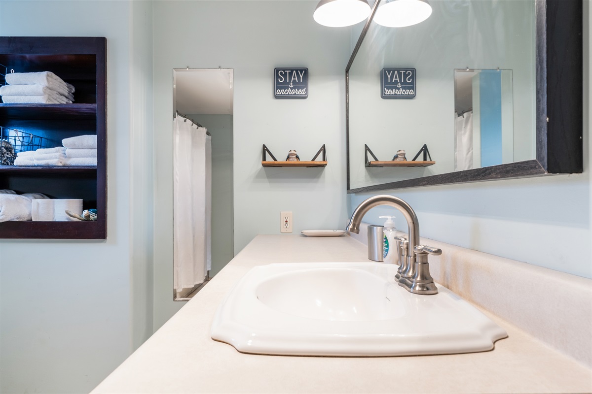 One of two full bathrooms