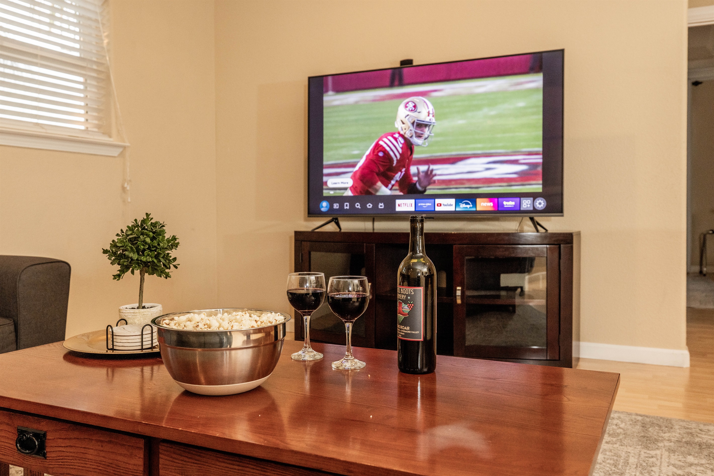 Cozy up with the game in our upstairs family room.
