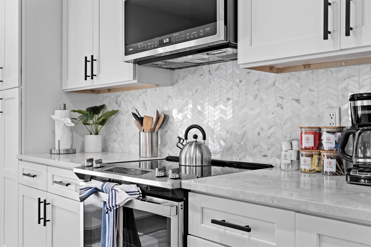 Every detail in this designer kitchen has been thoughtfully curated, creating a bright and welcoming space that feels both luxurious and inviting.