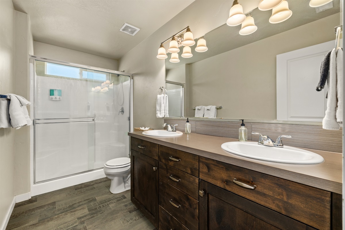 Home #2 Primary Bedroom on suite bathroom with dual sinks