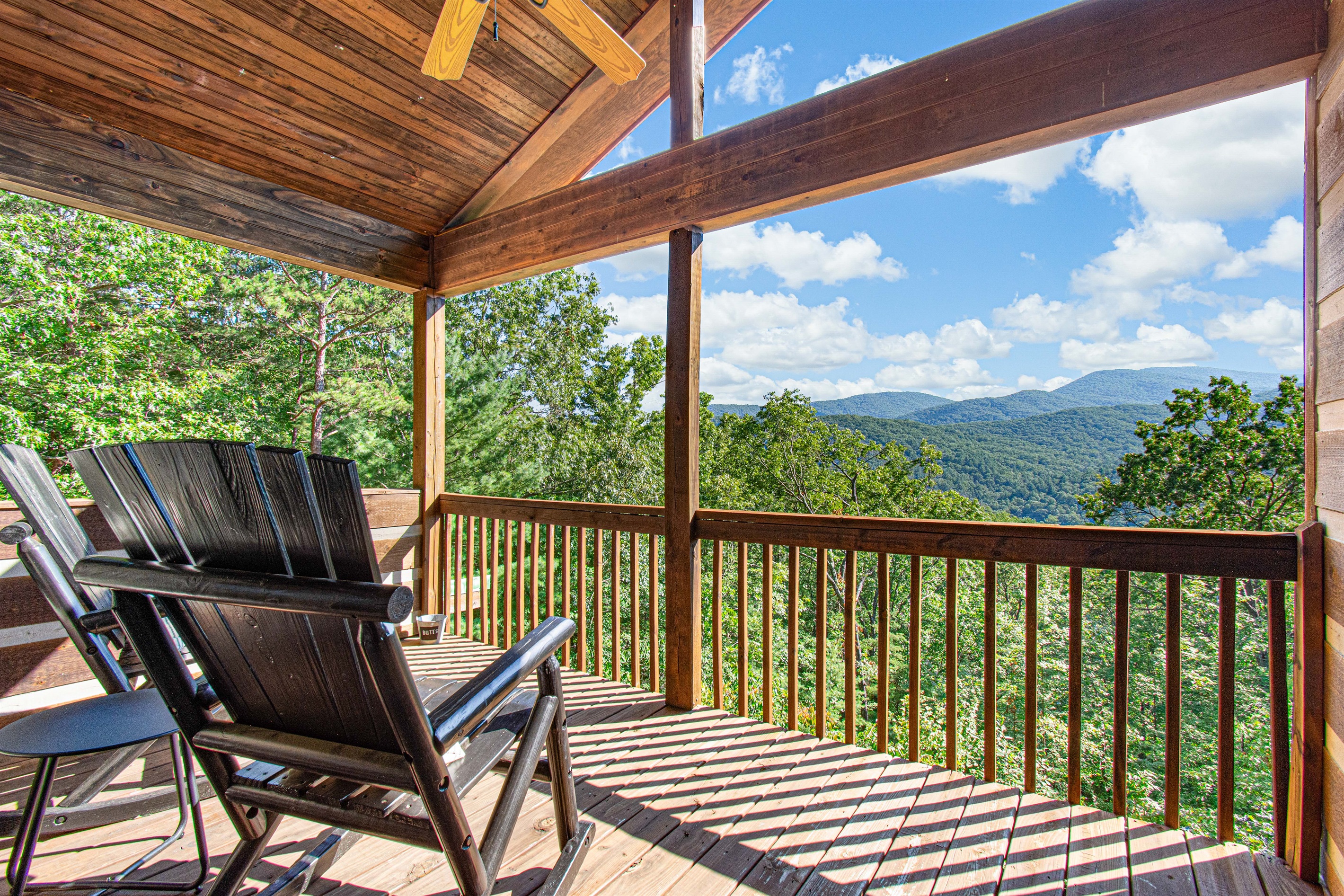 Enjoy long range mtn. views from the 2nd floor porch. Located off the two 2nd floor master bedrooms.