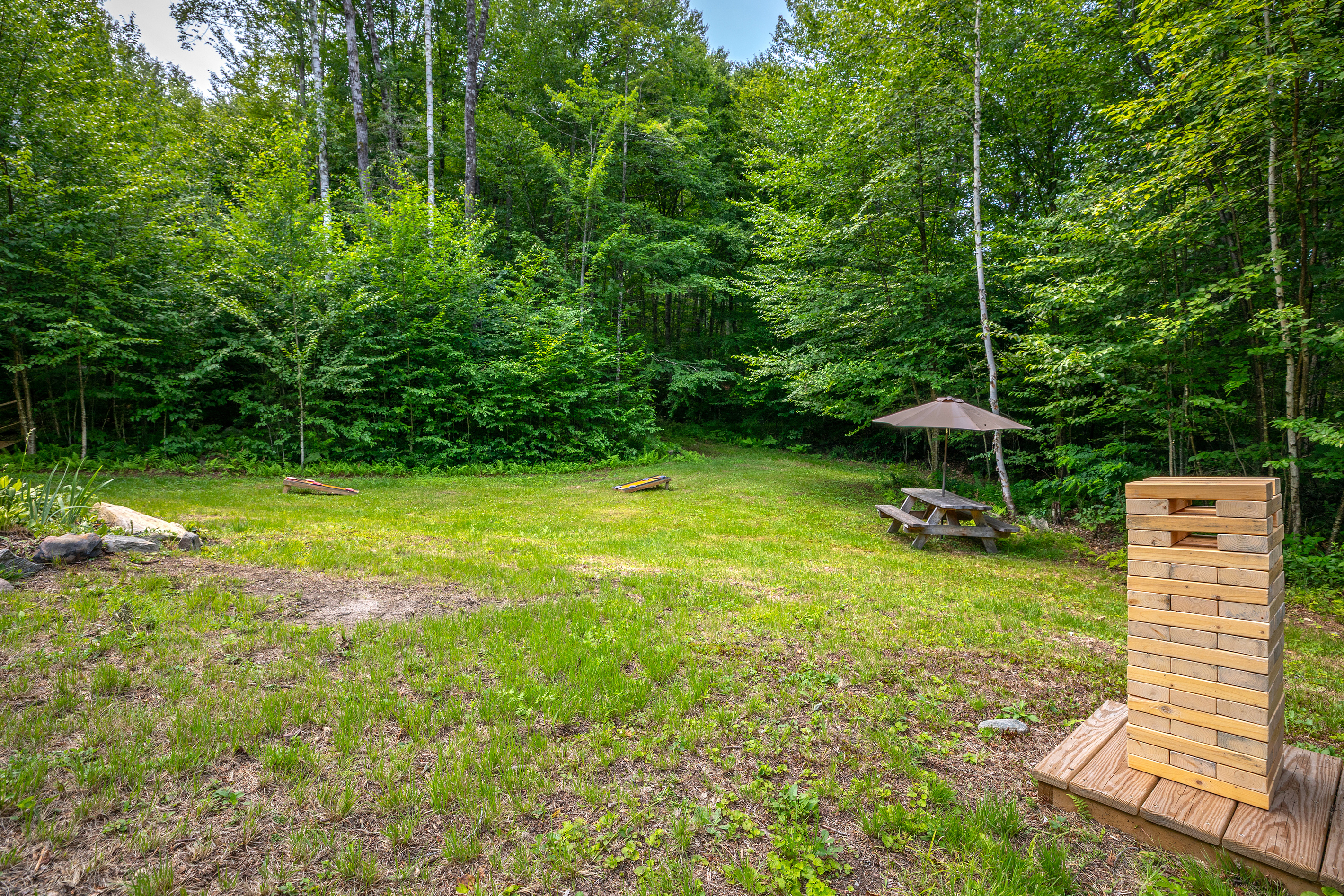 Outdoor game area with picnic table + giant Jenga