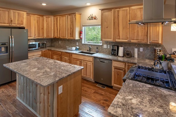 Create culinary delights in our fully equipped kitchen on the main level.