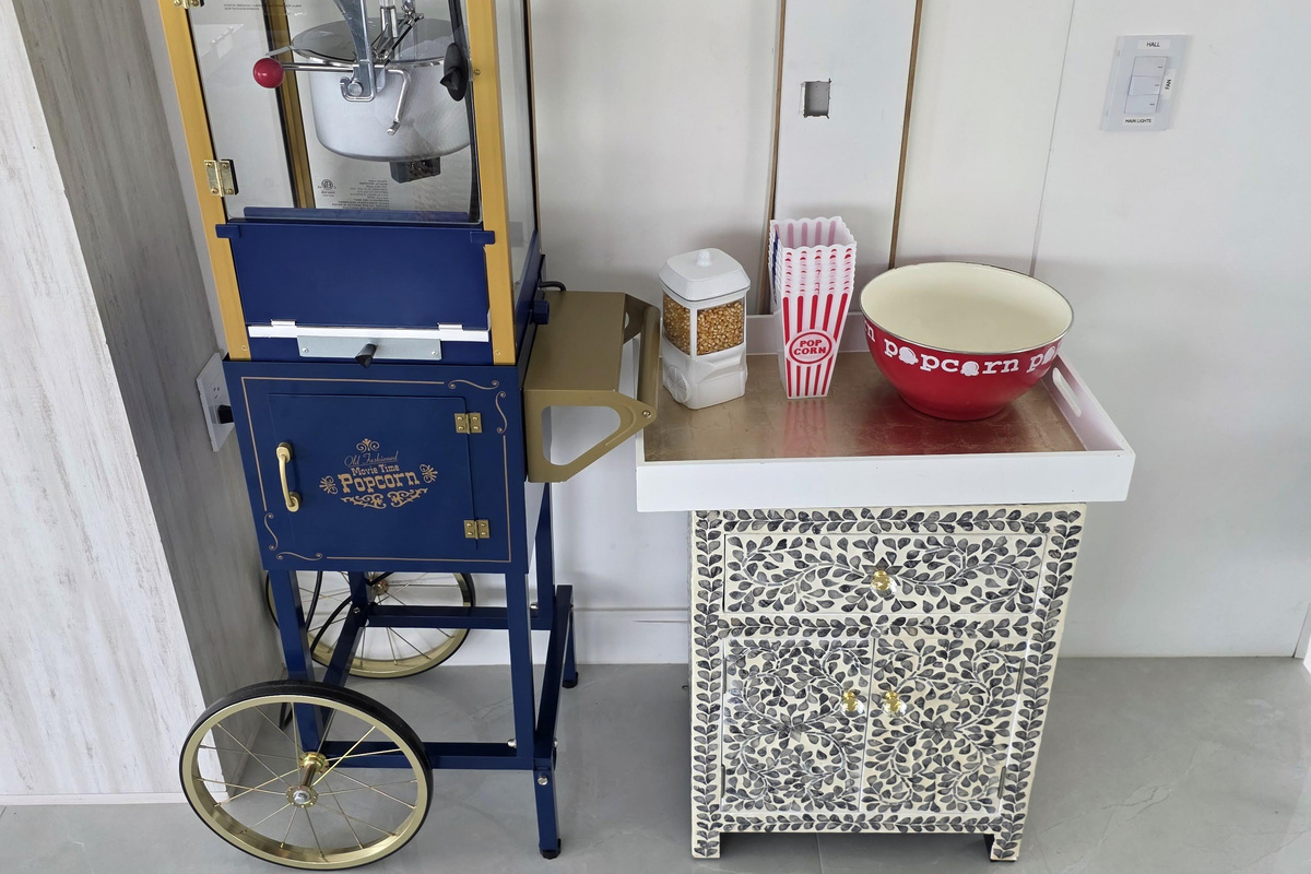 Popcorn machine on the second floor, in the movie room