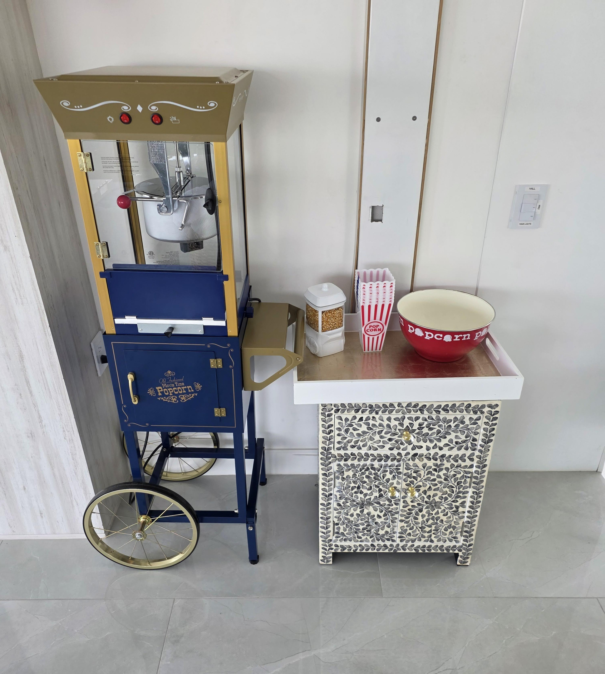 Popcorn machine on the second floor, in the movie room
