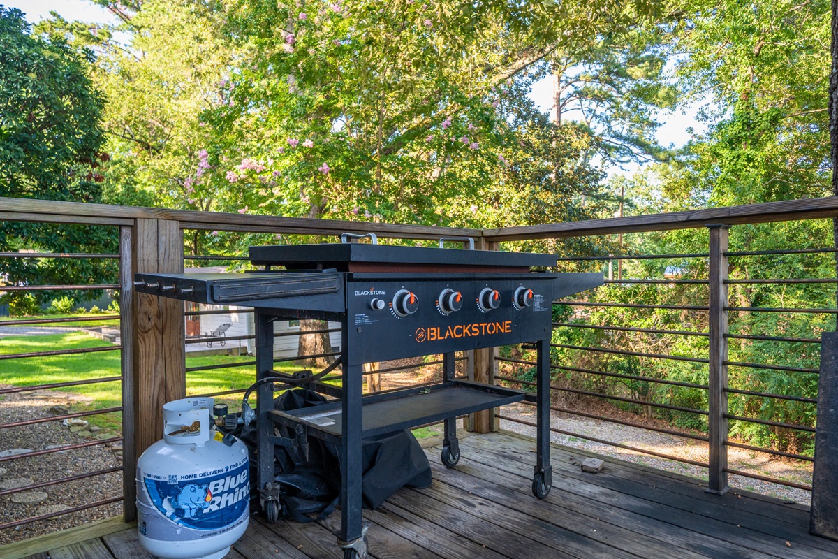 Sizzle your favorites on the Blackstone grill while enjoying lake views from the back patio.