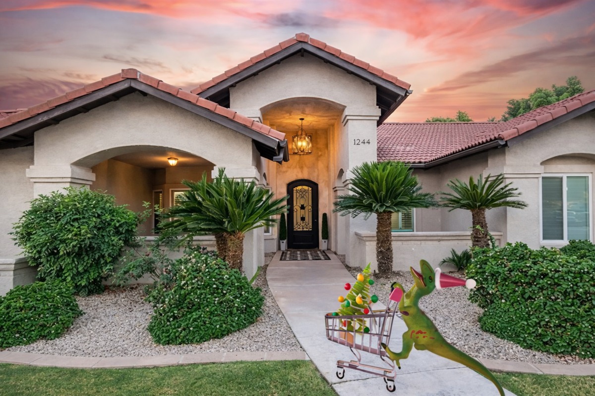 Beautiful custom home on half acre cul-de-sac lot with professionally landscaped front yard, basketball hoop, and 2 cozy courtyards.