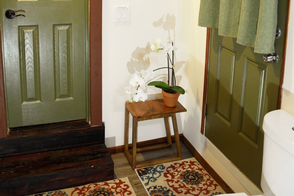 Bathroom w/door to outdoor shower and back patio