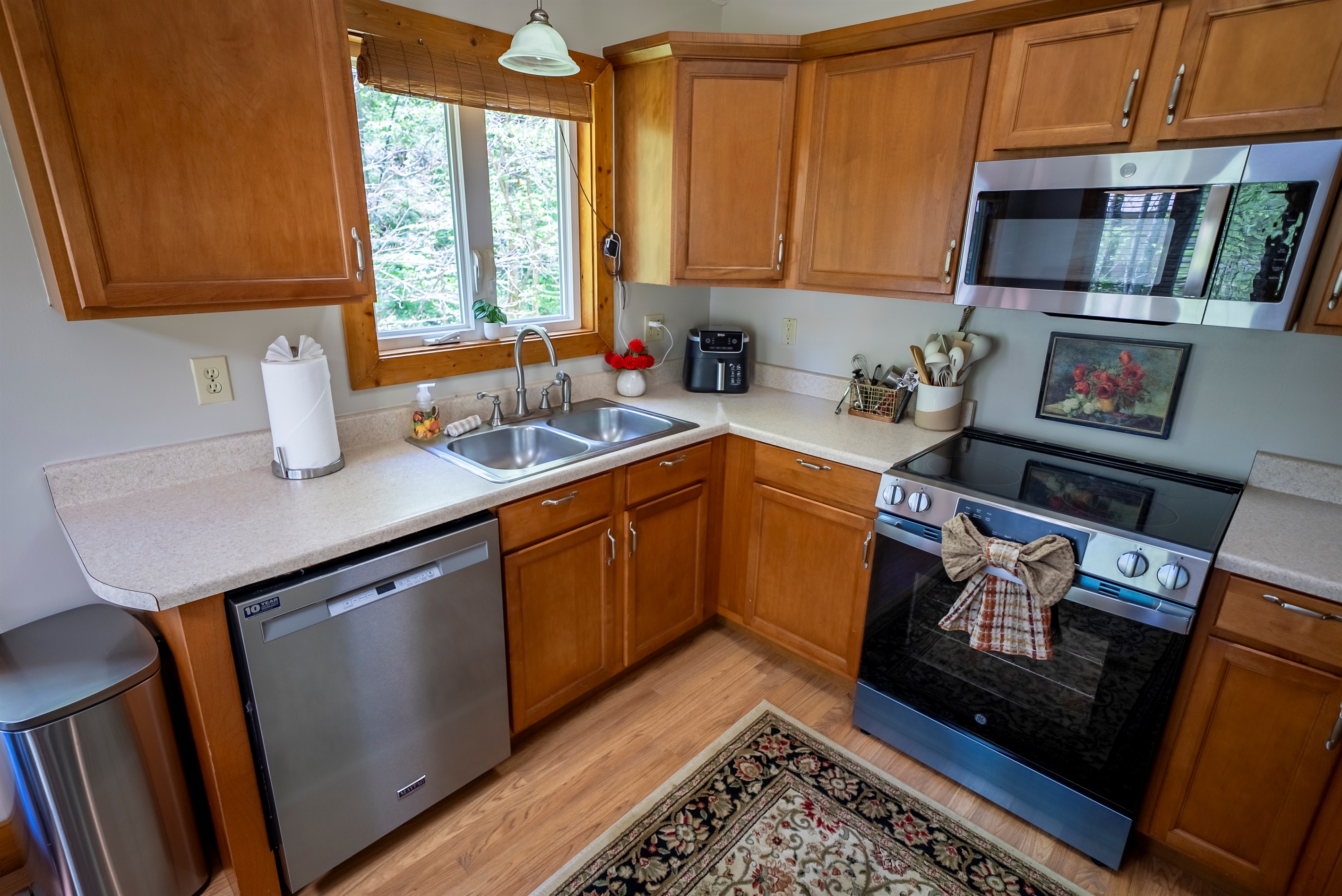 Cook, gather, and connect in this inviting kitchen at Mossy Rocks Retreat.