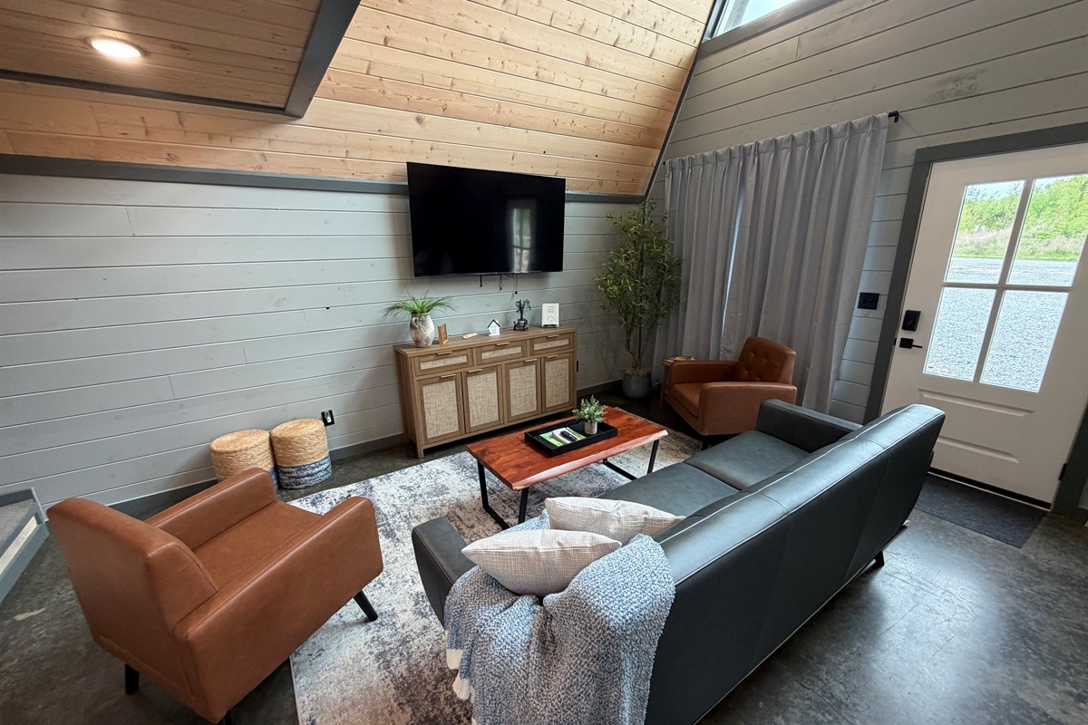 Lower-Level Lounge: Relax and unwind in our cozy downstairs living room.