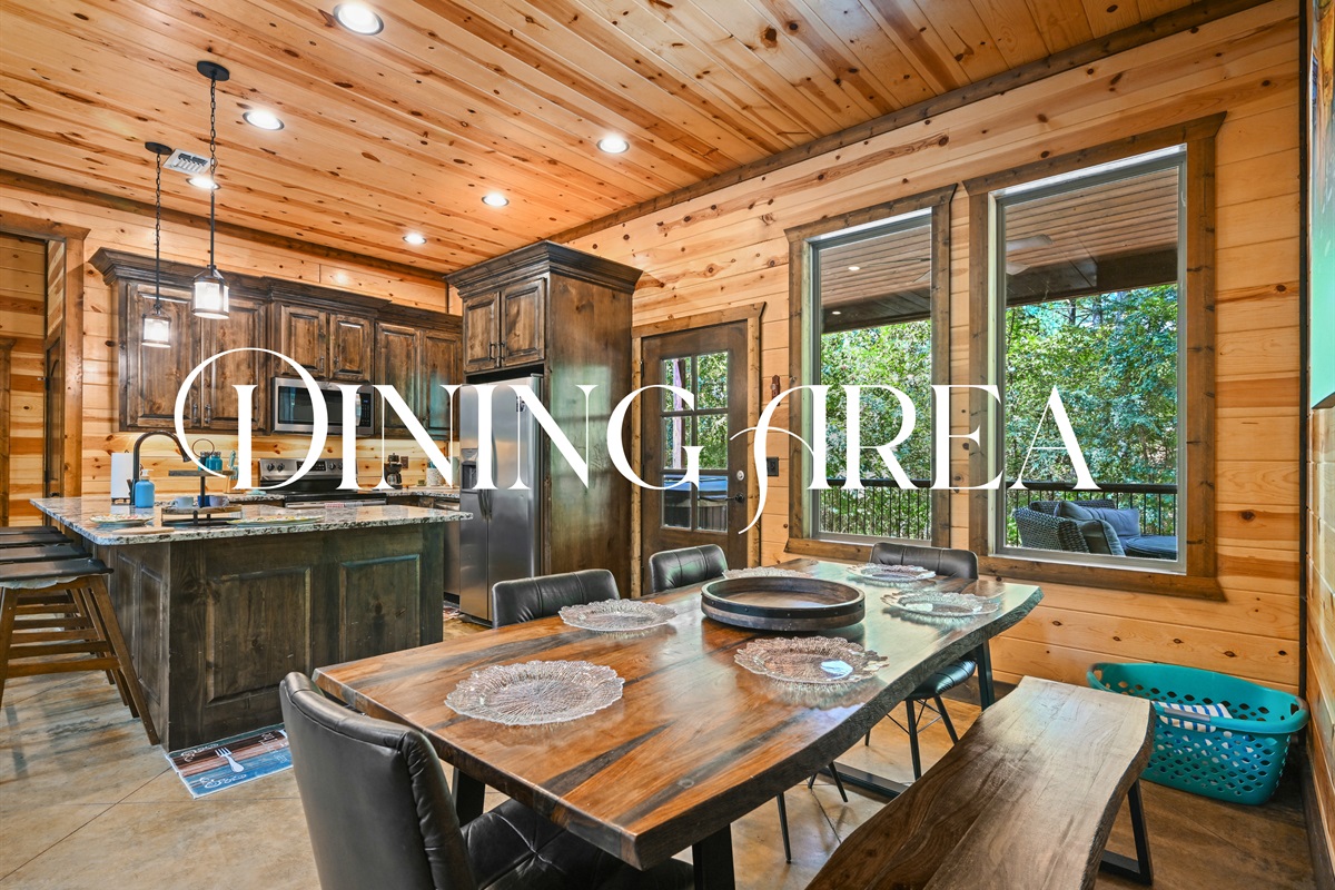 Gather around the rustic wood table for meals, games, or late-night chats—it’s the heart of the cabin experience.