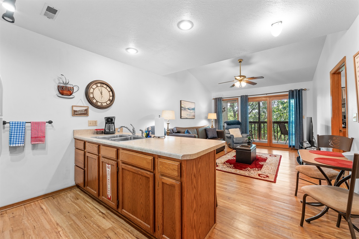 The open kitchen and bar seating make it easy to cook, snack, and still stay part of the conversation.