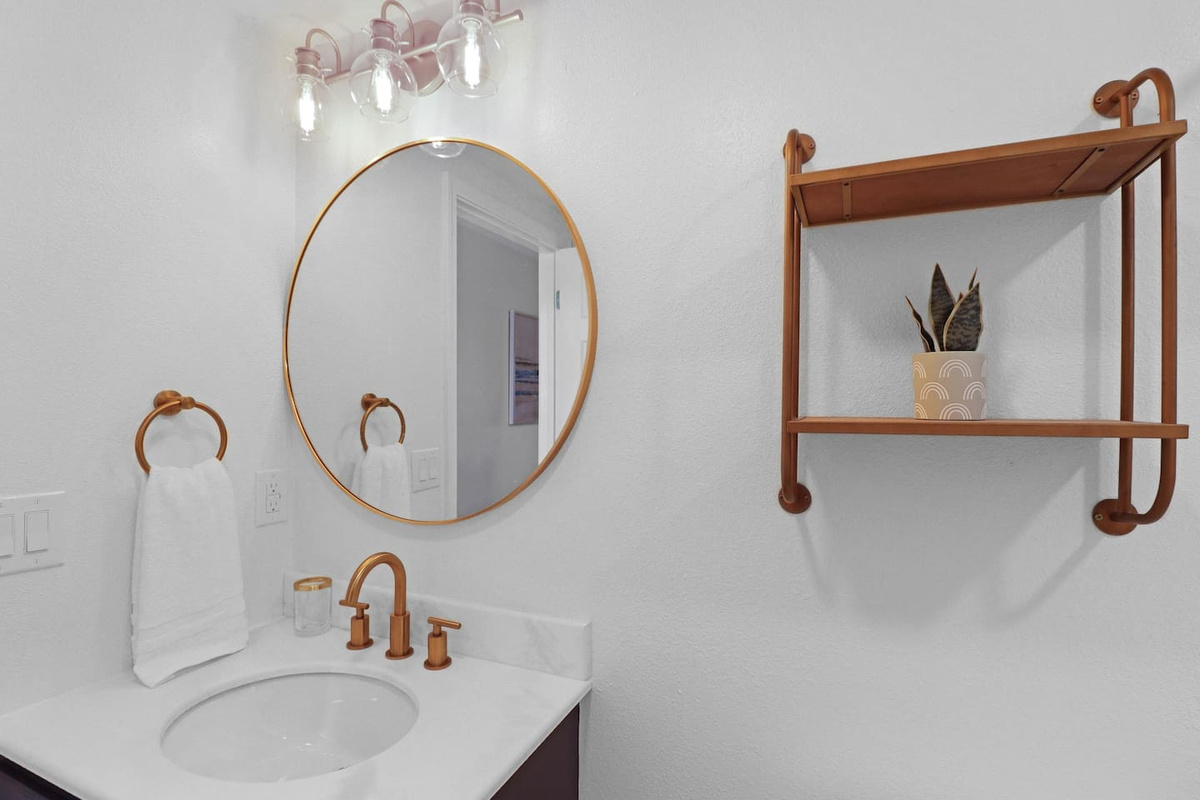Step into a stylish, fully updated main-level bath &mdash; clean, complete, and exactly where guests need it.