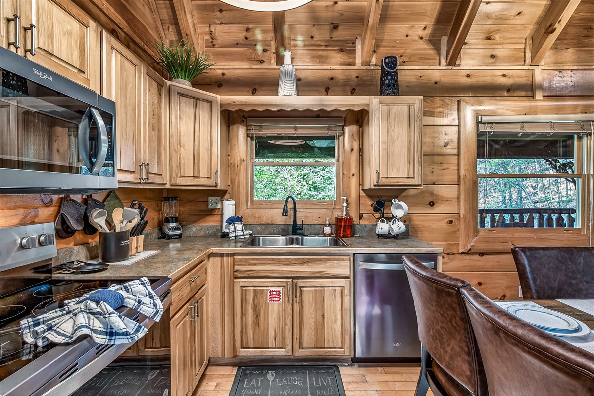 Warm, beautifully appointed kitchen fully stocked with everything you need to cook and enjoy meals together after a day in the Smokies.