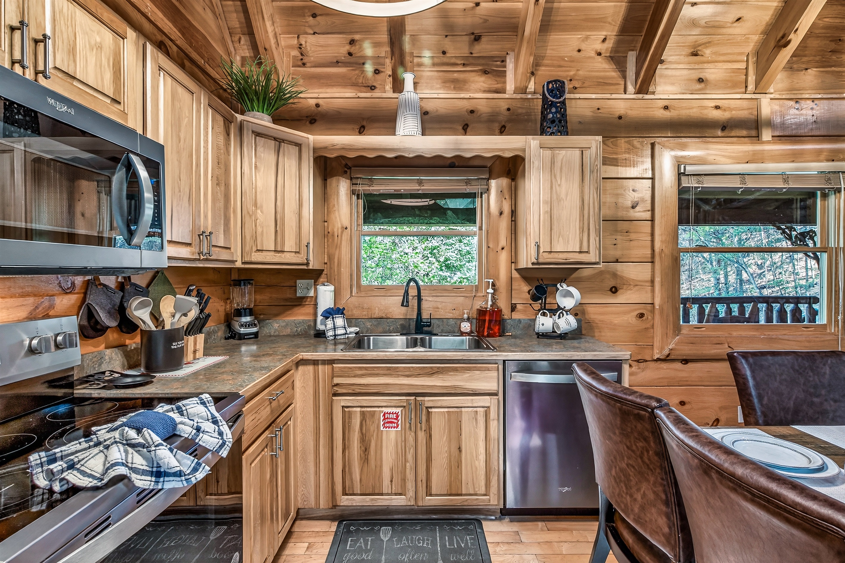 Warm, beautifully appointed kitchen fully stocked with everything you need to cook and enjoy meals together after a day in the Smokies.