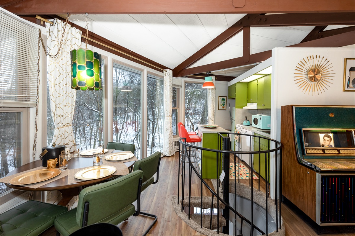 Watch the birds as you eat a meal surrounded by trees. Play old records. 