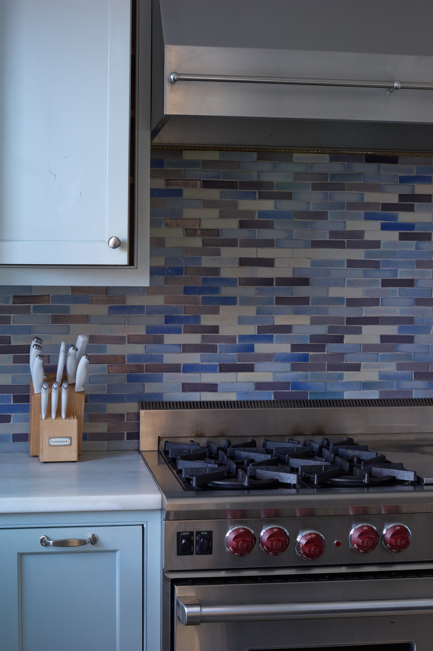 Premium stainless steel appliances, including a high-end gas range, are ready for your home-cooked meals.