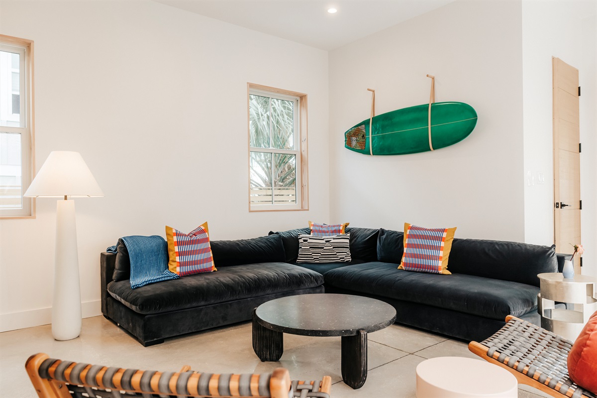 A living room made for movie nights + mid-day lounging 🤍 Big comfy sectional, coastal style, and space for everyone