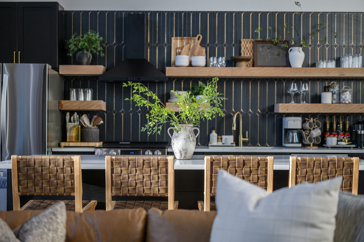 A beautifully designed, fully stocked kitchen made for gathering, with generous counter seating, modern finishes, and everything you need for easy meals, coffee & time together.
