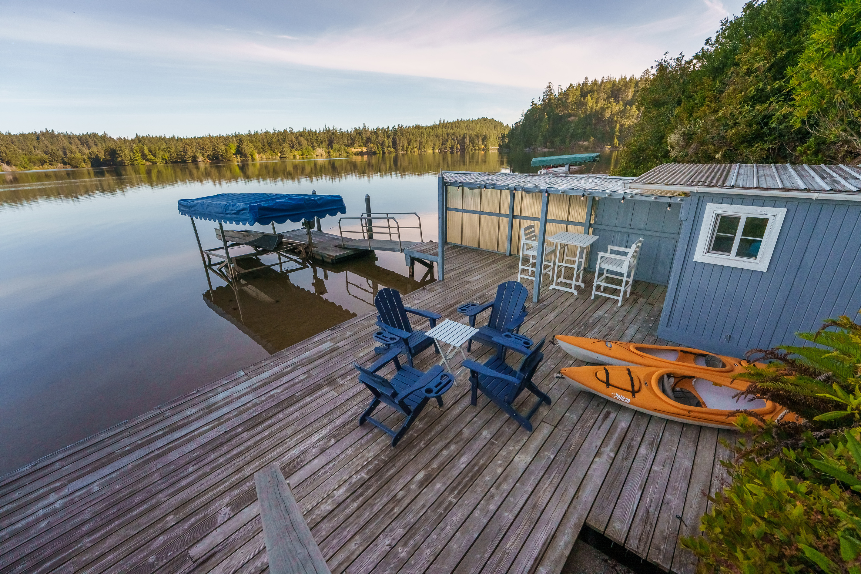 Four complimentary kayaks are ready at your private dock—just step outside, launch into Woahink Lake, and begin exploring the peaceful shoreline together.