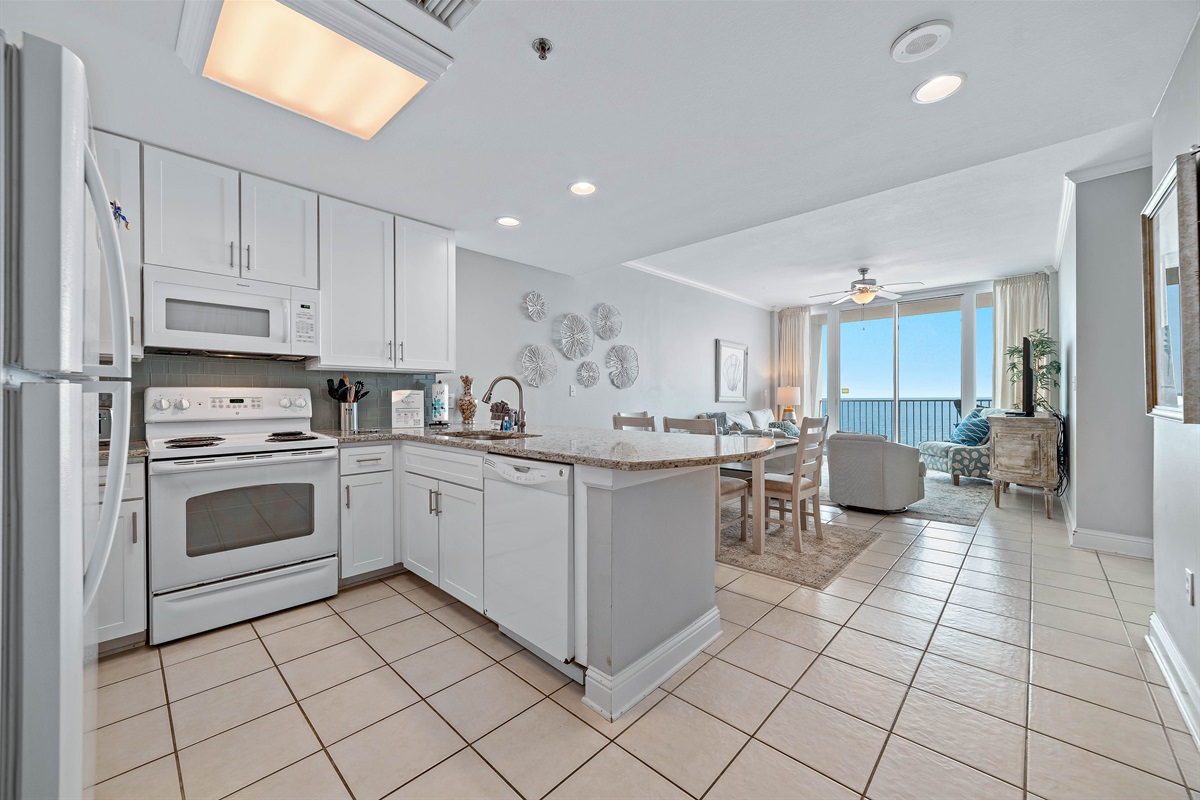 Bright and airy kitchen with ample counter space and modern amenities, creating an inviting space for cooking and gathering.