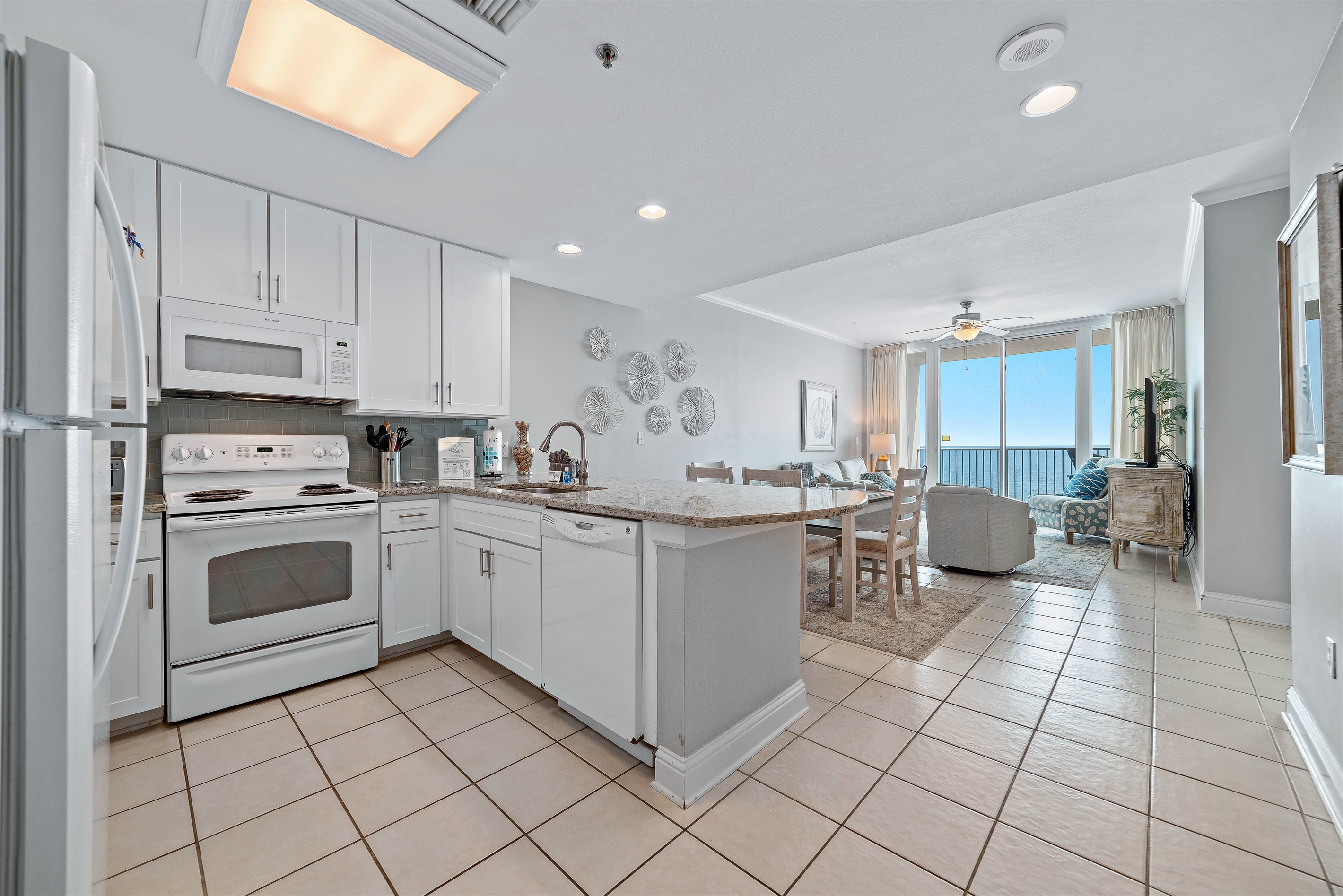 Bright and airy kitchen with ample counter space and modern amenities, creating an inviting space for cooking and gathering.