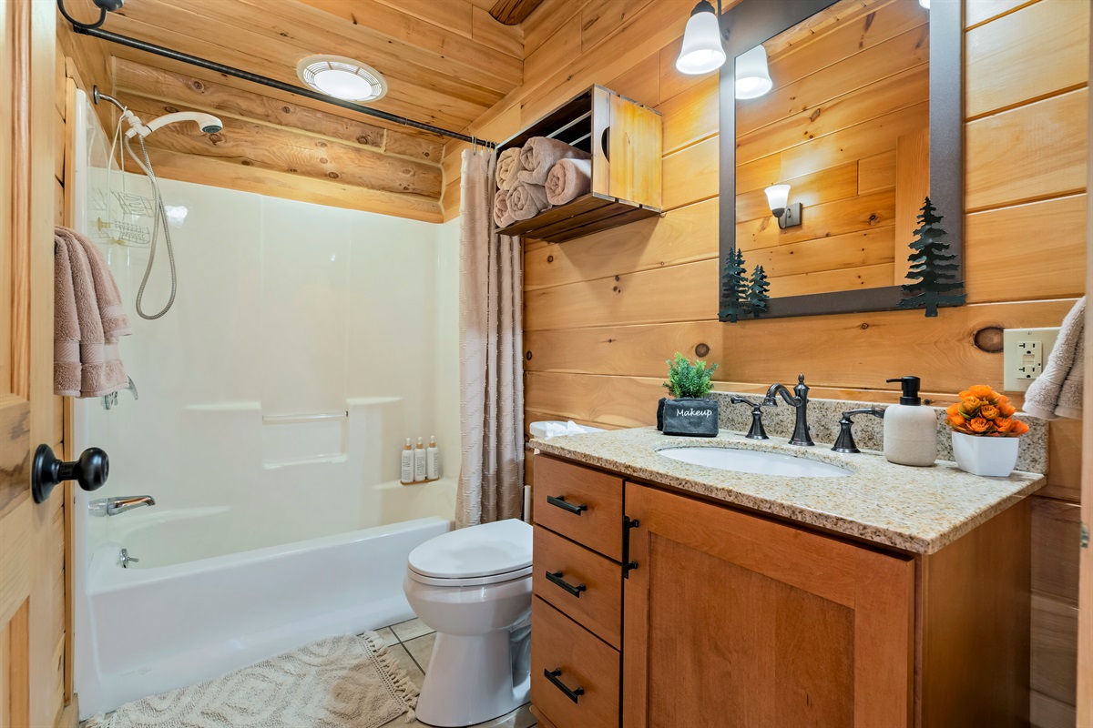 Modern full bath with tub and shower for a relaxing experience.