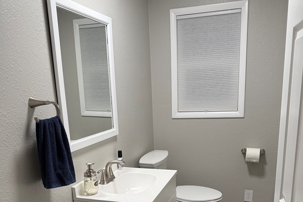 Half bathroom. Simple and steps away from the kitchen