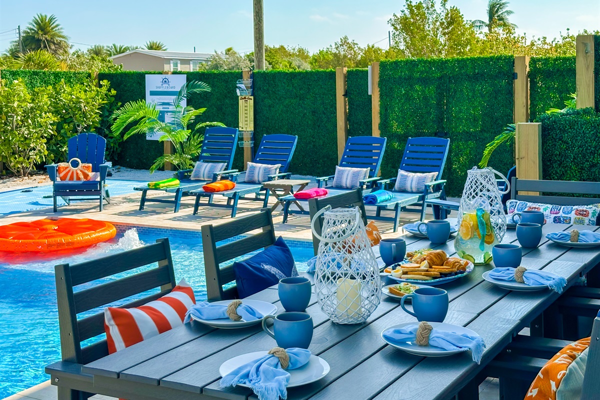 The first dining table seats 8 people.