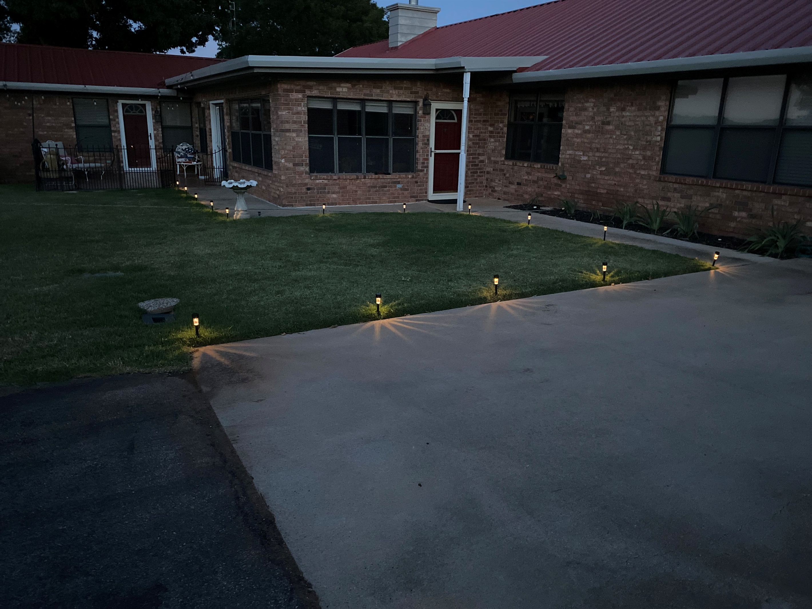 Keep following the lights from the parking area around the corner to the Apartment entry