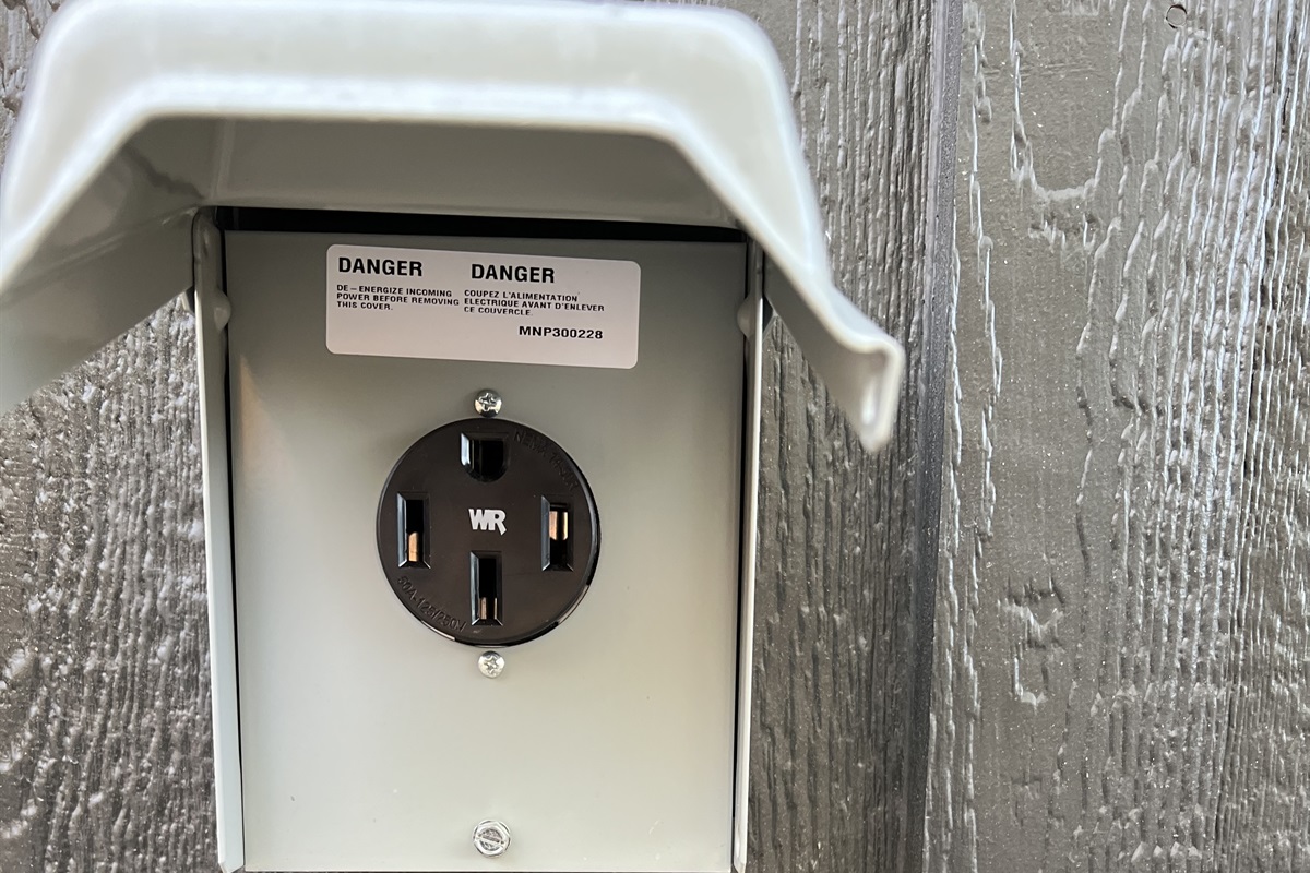 Outlet and power provided; bring your EV charging cord.