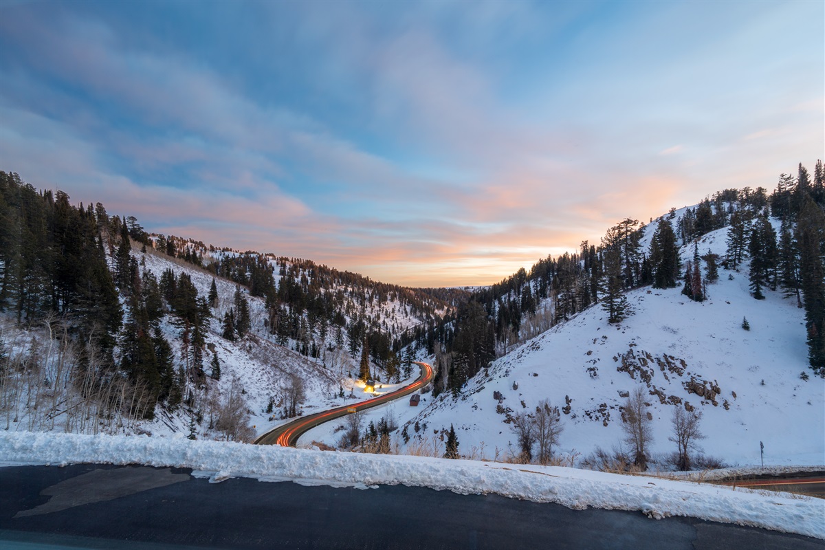 Winter sunset over Powder Mountain roads.
