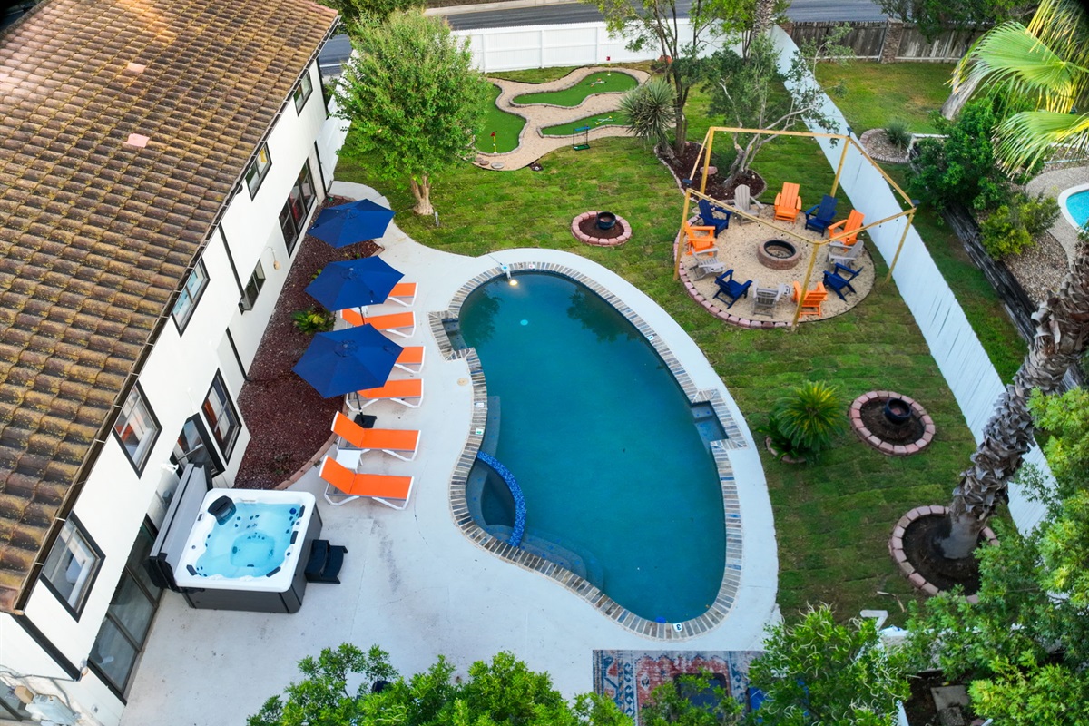 Resort-style patio with plenty of seating for lounging, chatting, and poolside fun. A perfect blend of luxury and leisure! Your ultimate San Antonio retreat awaits at the Comfy Coyote.