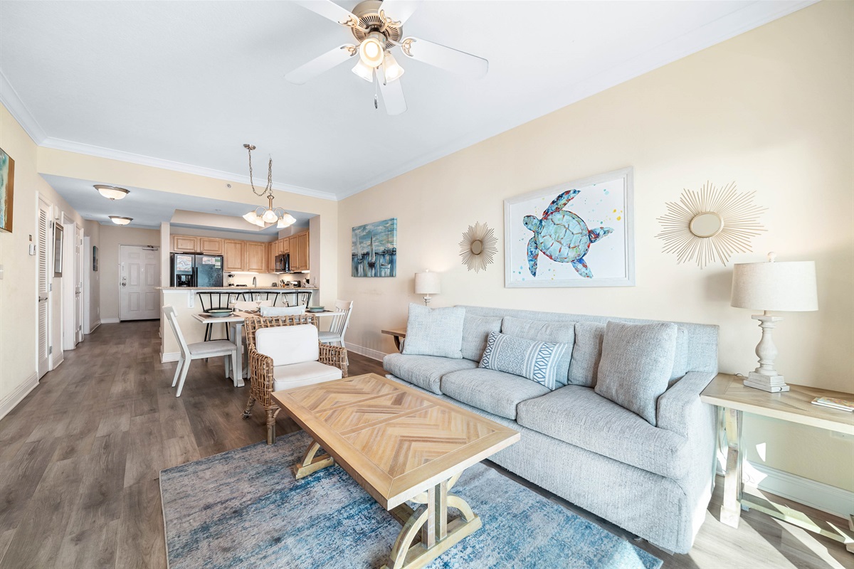 Light and airy living space featuring coastal-inspired decor and a seamless flow between the living and dining areas.
