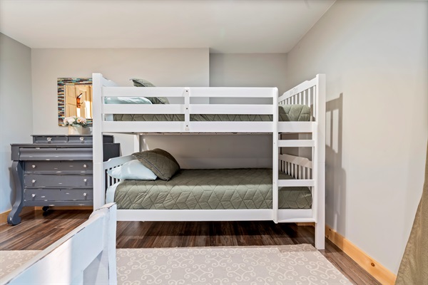 Spacious basement bedroom with room for everyone.