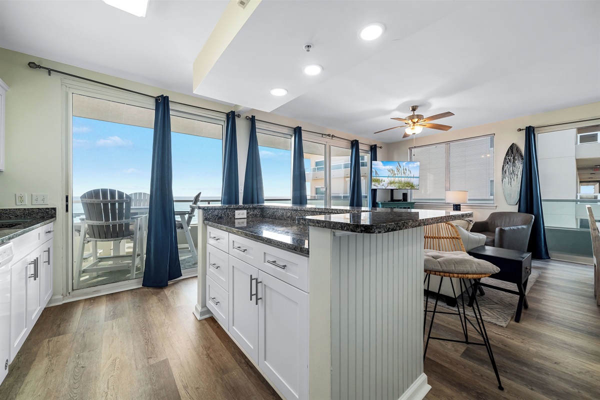 Beautiful stocked kitchen with Stainless appliances, granite tops and tiled backsplash! 