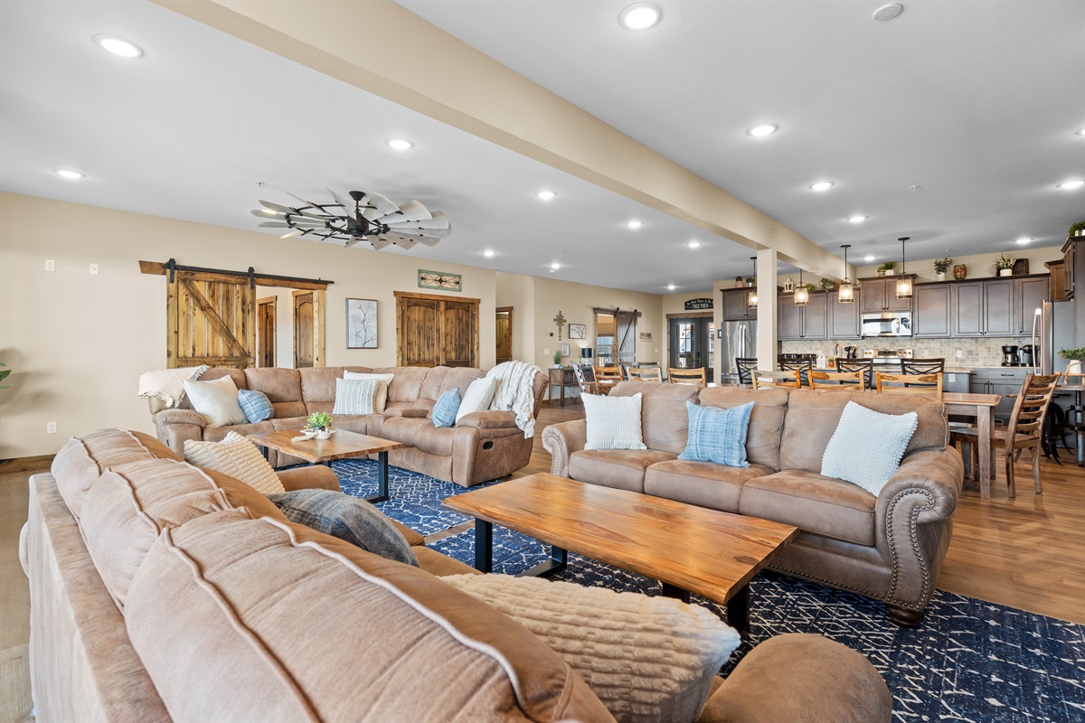  Huge gathering space with comfortable seating, fireplace, and open kitchen perfect for large groups 