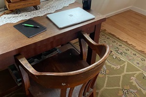 Wood desk and chair amenity