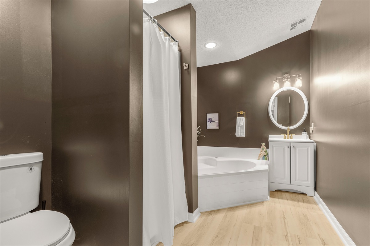 Ensuite bathroom attached to BR3 with soaker tub and shower
