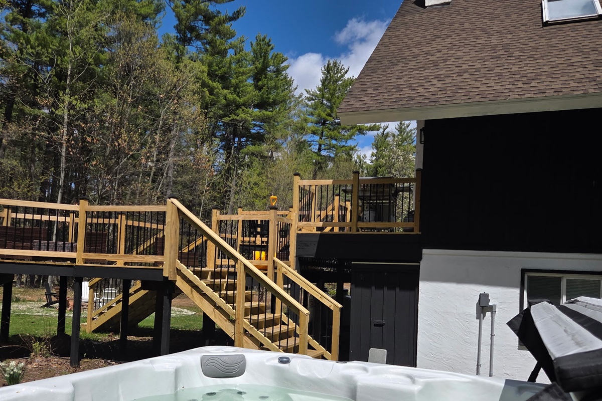Enjoy a private hot tub surrounded by the Adirondack trees, perfect for unwinding after a day of hiking, skiing, or exploring the mountains.