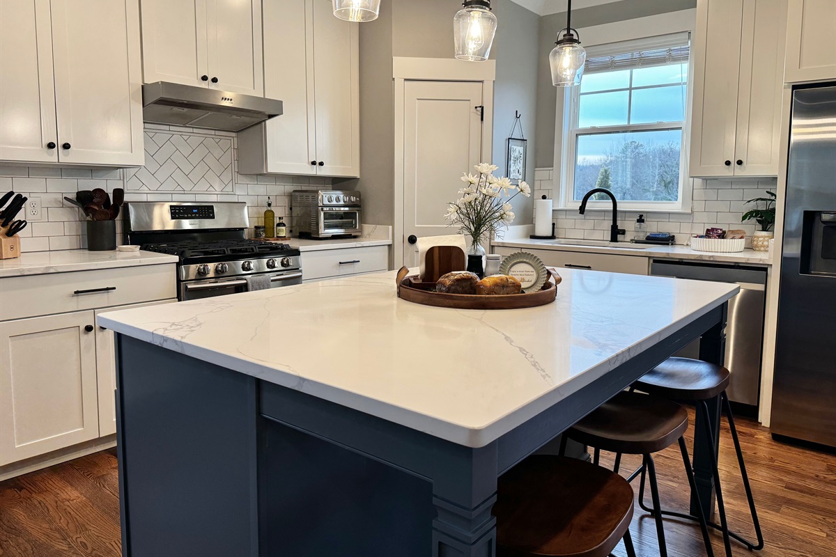 Whether you are brewing a quiet morning coffee or preparing a full family dinner, this fully equipped kitchen has everything you need.