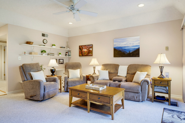 Our comfortable living room features comfy recliners for everyone to relax together.