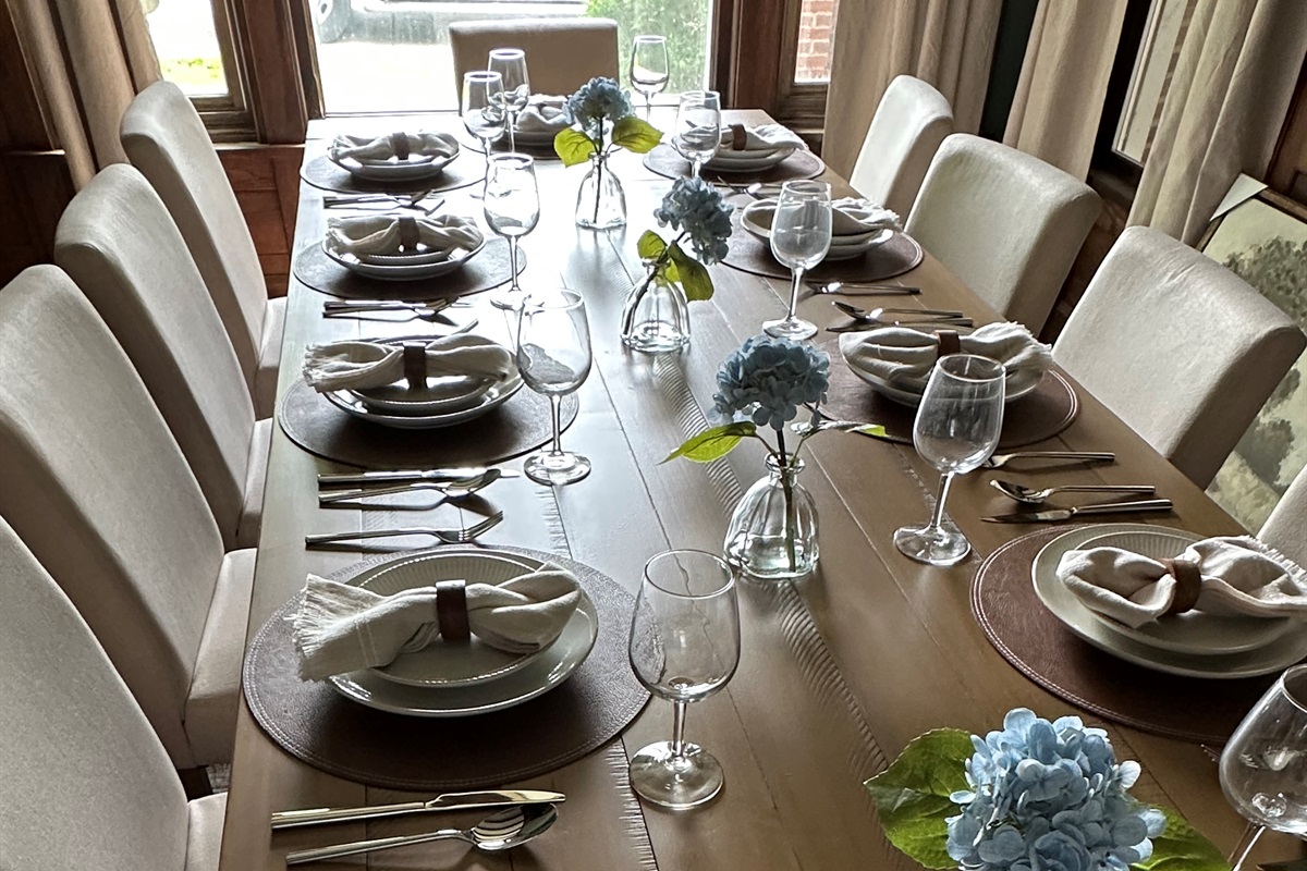 Gather, celebrate & make memories around a table designed for connection. With seating for 12, this warm & inviting space is perfect for wedding parties, family dinners, holiday gatherings & unforgettable nights spent laughing long after dessert is served.
