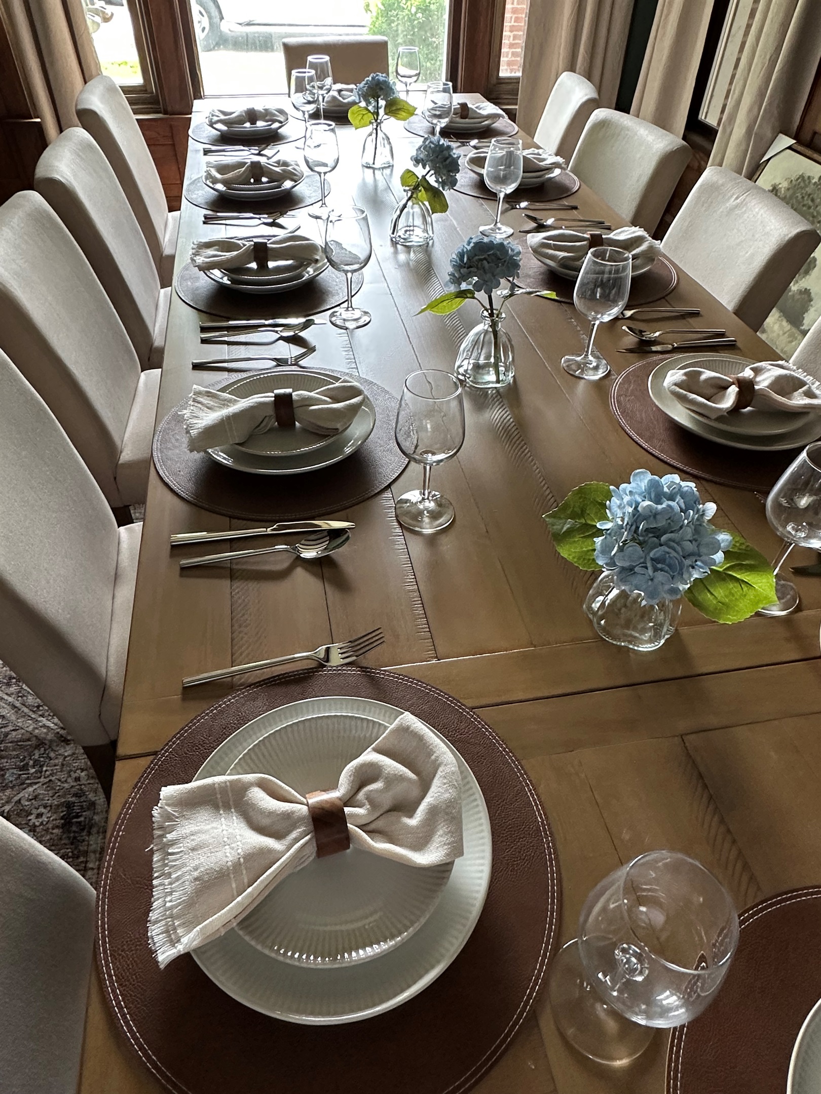 Gather, celebrate & make memories around a table designed for connection. With seating for 12, this warm & inviting space is perfect for wedding parties, family dinners, holiday gatherings & unforgettable nights spent laughing long after dessert is served.