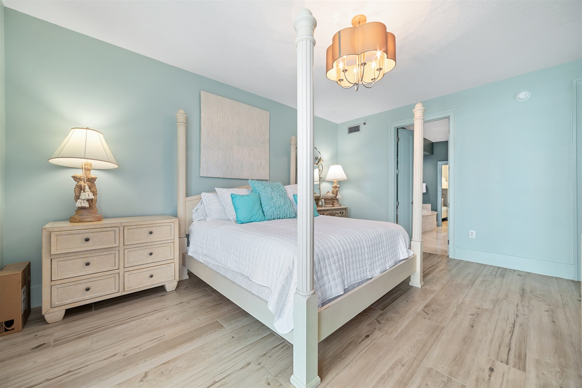 A peaceful haven with breathtaking views. The primary bedroom offers a tranquil escape, where comfort and beauty meet in perfect harmony.