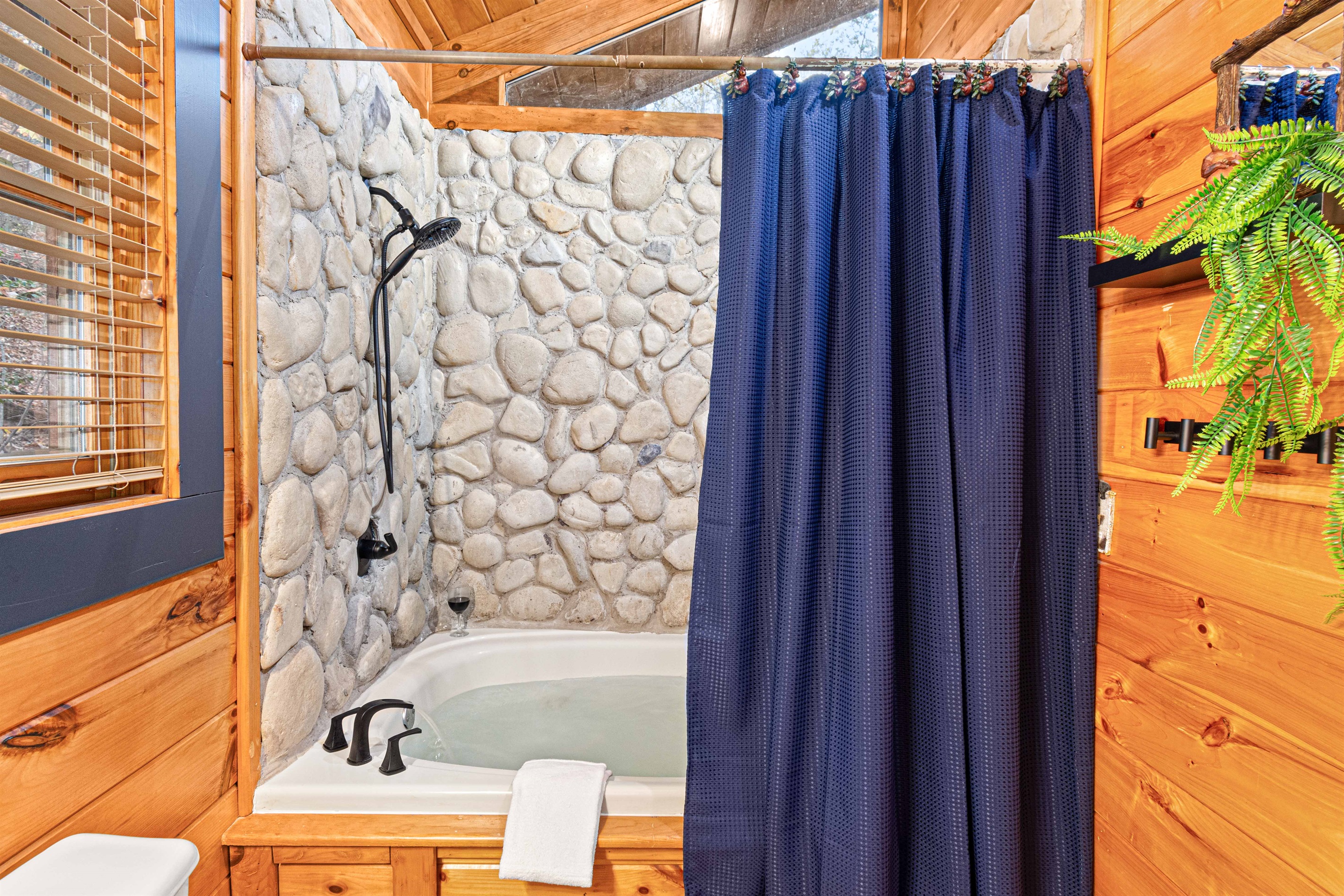 Huge jacuzzi tub with shower. It's an experience